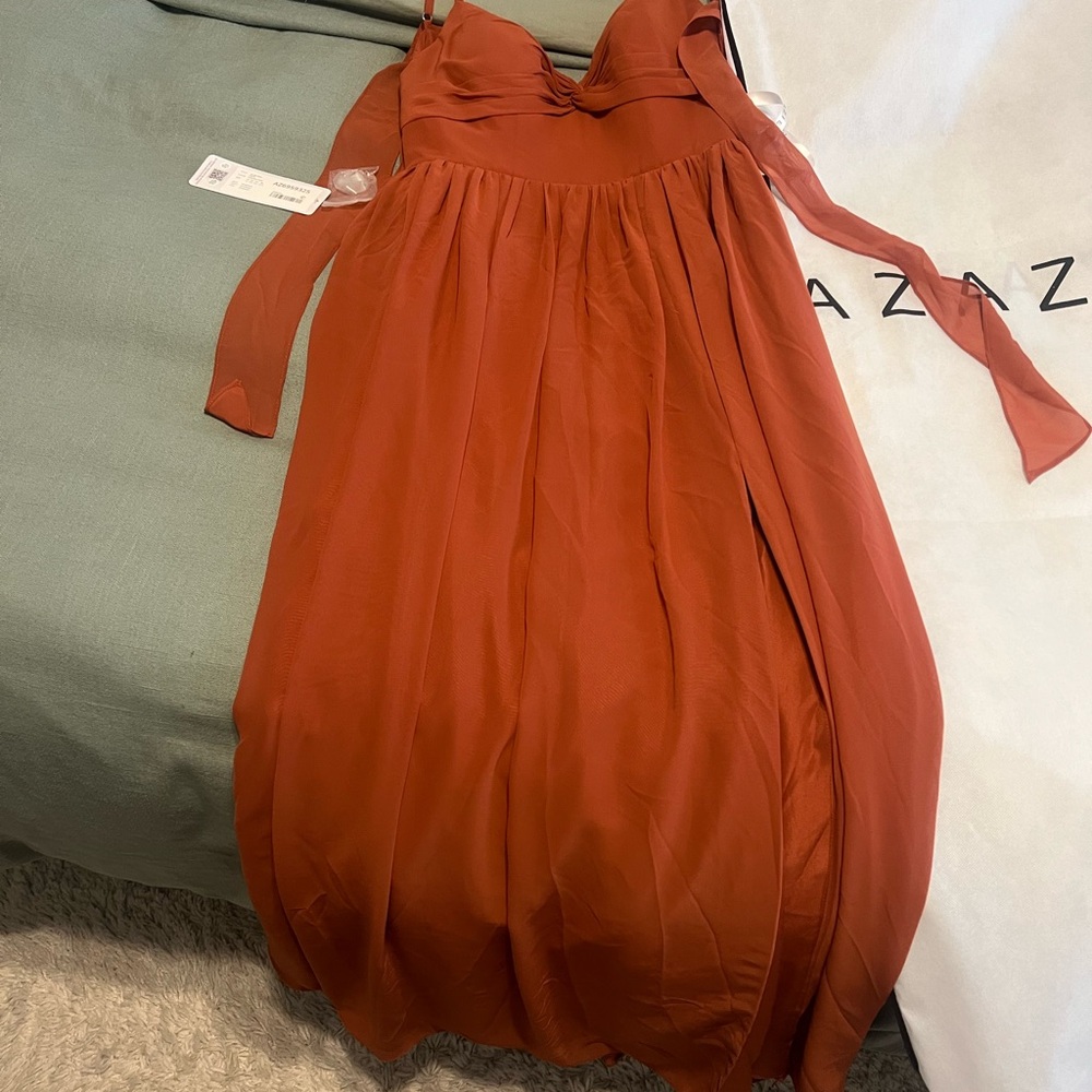 Never worn, Auburn colored bridesmaid dress